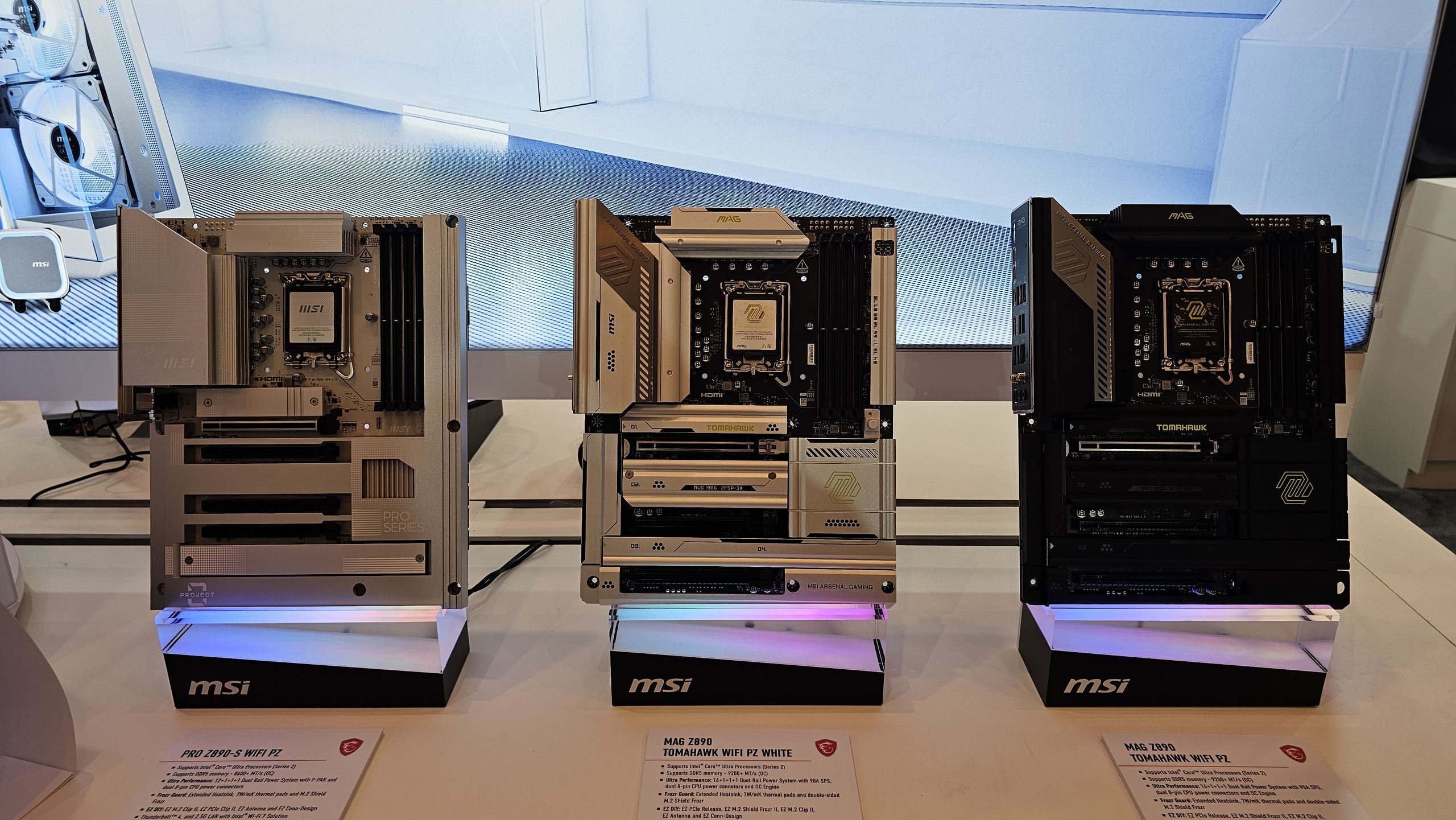 A stack of various computer motherboards showing their complex circuitry.