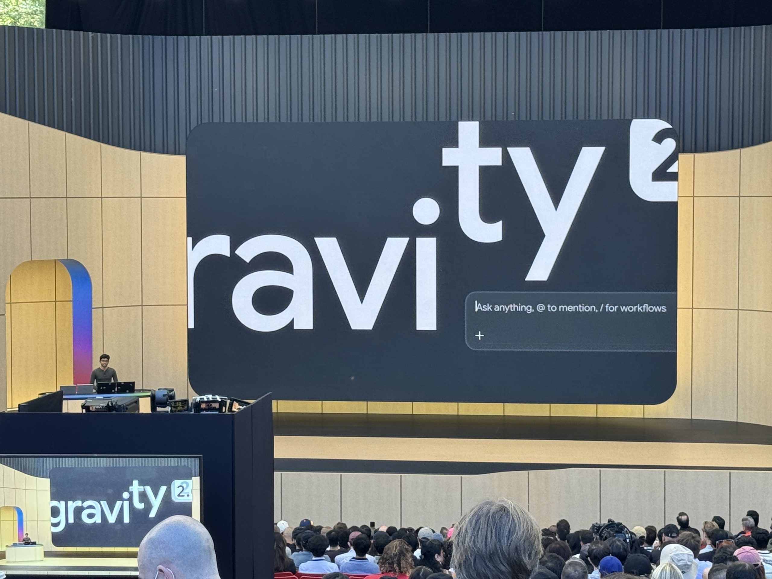 Google Antigravity platform interface showcasing multiple AI agents coordinating tasks.