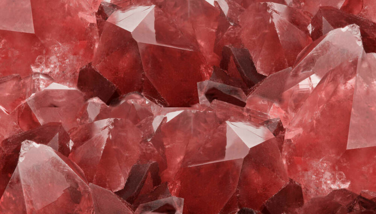 A worried-looking person holding a broken piggy bank with Ruby gems spilling out.