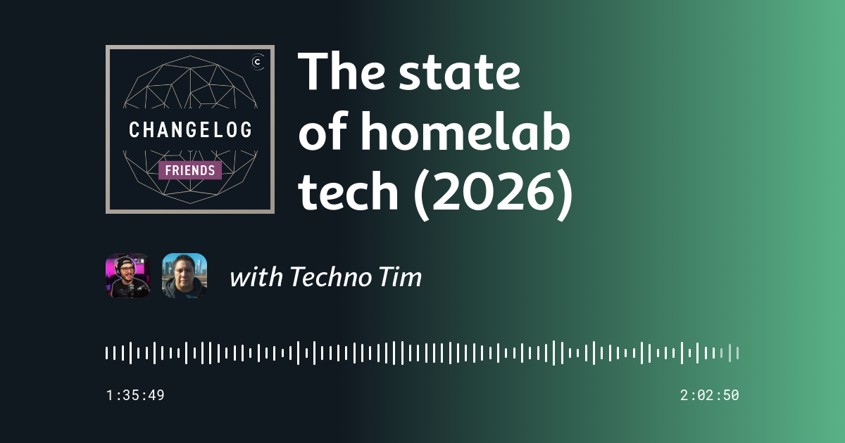 A well-organized homelab rack with servers, storage, and networking equipment, bathed in blue server light